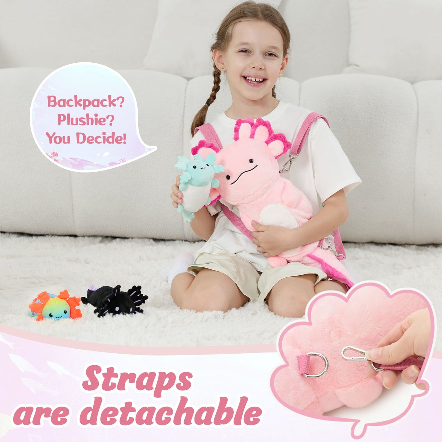 Child holding a pink plush toy with detachable straps, sitting on a couch.